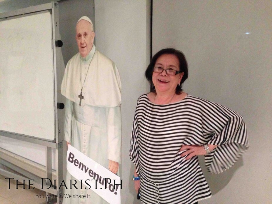 Letty in the conference room in 2015, celebrating the successful coverage of Pope Francis' 2015 visit to Manila. She would pass away by the end of the same year.