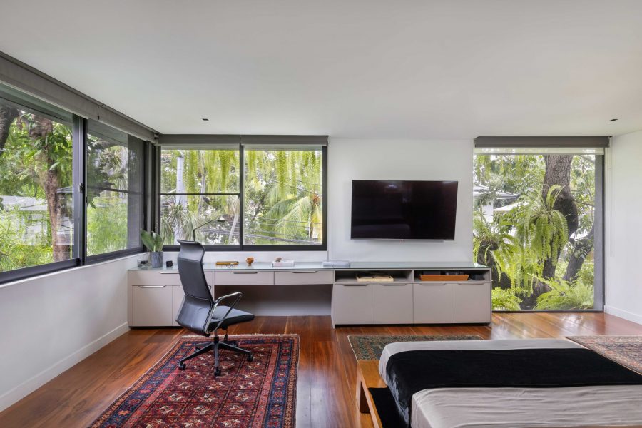 bedroom with wide windows