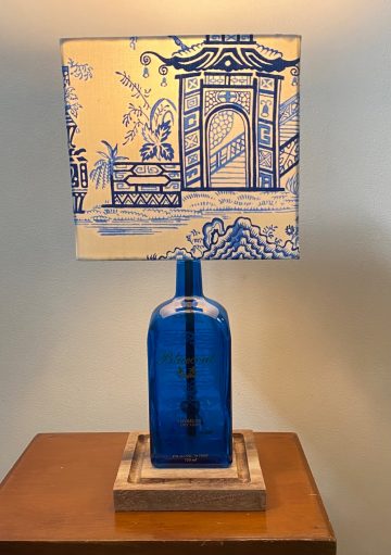 Drink to light! Couple repurpose liquor bottles