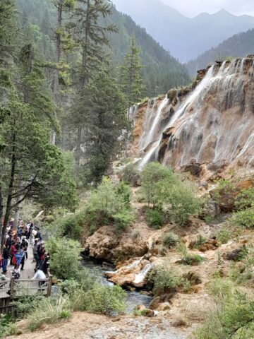 The tour guide warned, ‘Please follow me, or else you become Chinese!’